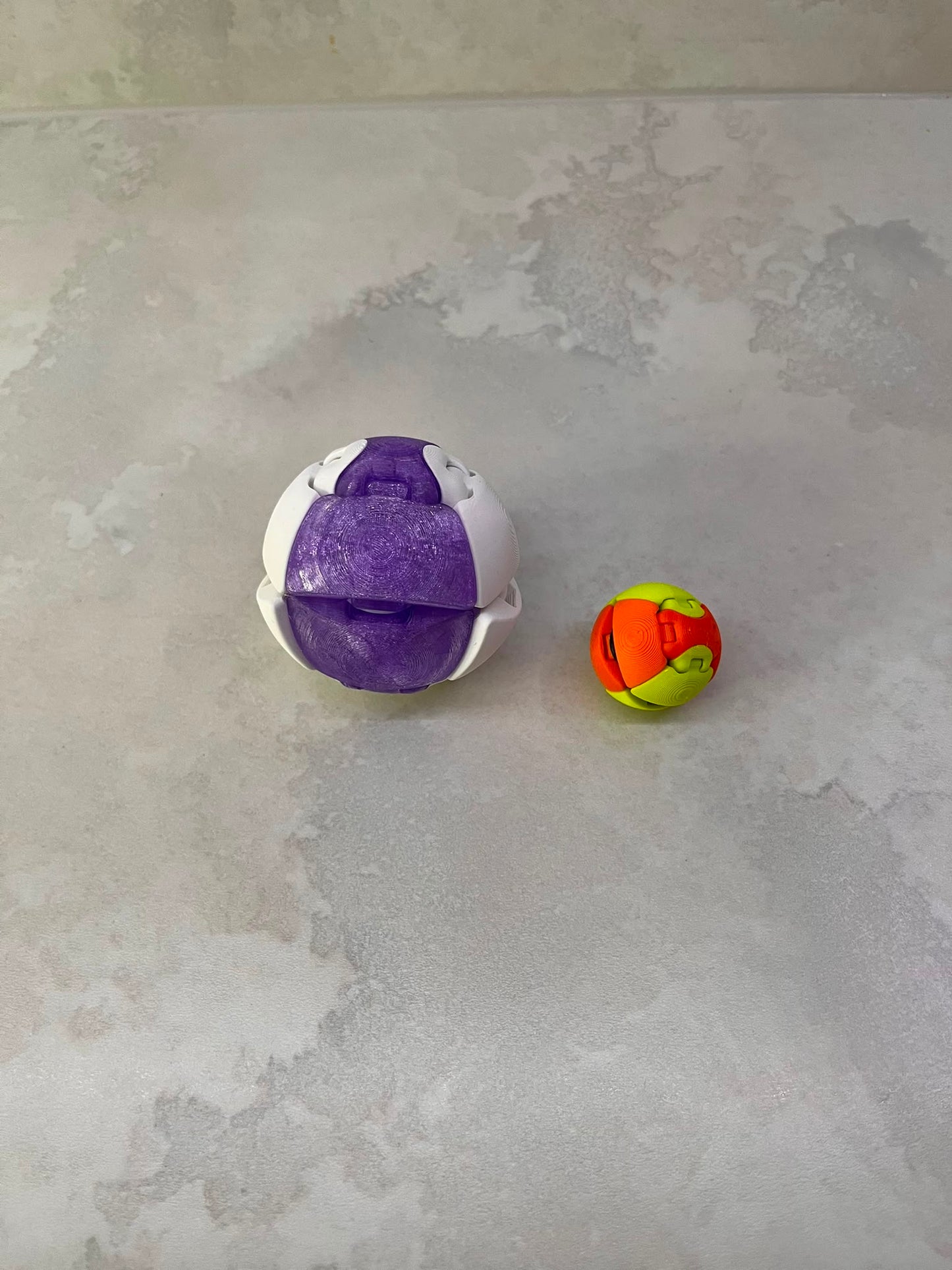 ZORBLES - 2 sizes of fidget ball clickers